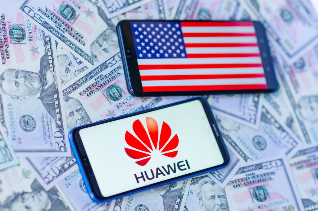 Hidden Backdoors in Huawei Chips